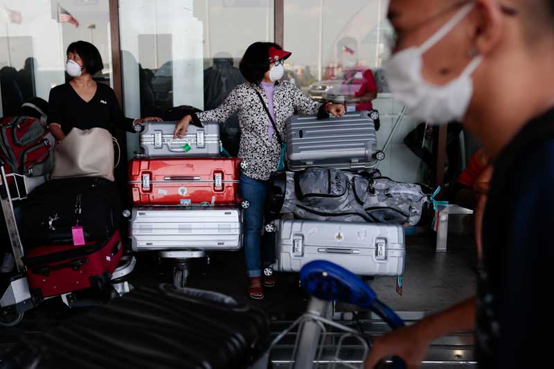 airport-passenger-with-baggage
