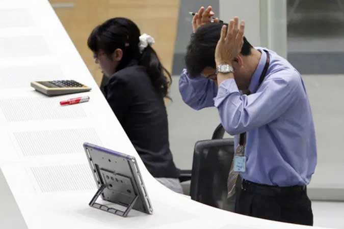 headache-worker-reuters