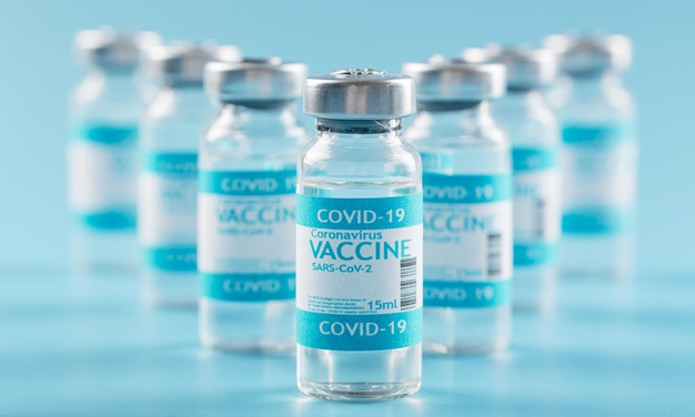 preventive-coronavirus-vaccine-bottles-composition_23-2148920776