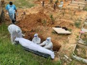 Malaysian volunteer undertakers struggle to cope as COVID cases surge