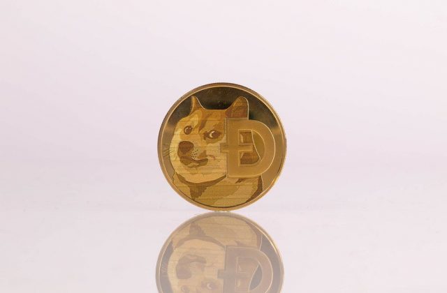 golden-dogecoin-on-white-background