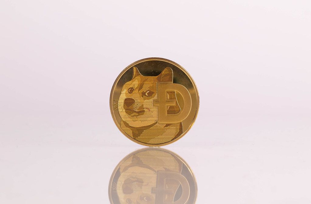 golden-dogecoin-on-white-background