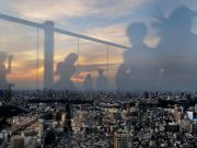 Japan’s COVID-19 adviser urges clear risk message as cases surge in Olympic host