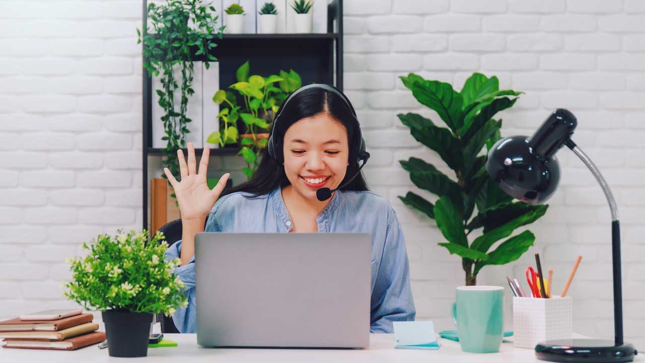 asian-woman-working-and-meeting-online-with-headph2