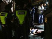 Three cops in drug war face murder charges