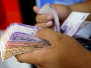 BSP says cash withdrawal cap not a factor in slowing growth