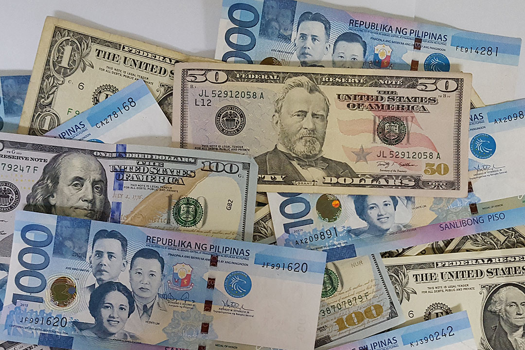 1.give the value of the following in philippine pesoA.5 dollars B.10  dollarsC.50 DollarsD.100 