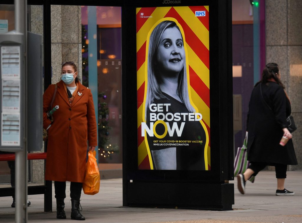 A government health campaign advertisement is seen at a bus stop, amid the spread of the coronavirus disease (COVID-19) pandemic, in London