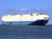 Firefighters struggle to douse fire on luxury cars vessel