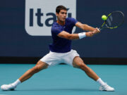 Alcaraz fights back to reach Wimbledon semifinals; Sinner toppled by Medvedev