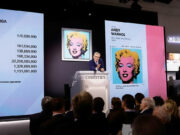 Warhol’s famed Marilyn silk-screen sells for record $195 million at auction