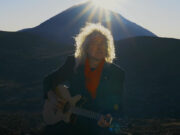 In Spanish debut, Brian May sings about ‘Another World’