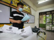 Comelec demonstrates protocols for voters with COVID symptoms