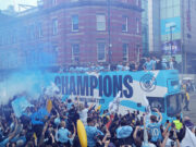 Man City paints town blue with open top bus parade