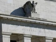 Divided Fed policymakers stake out positions ahead of December meeting
