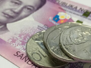 Peso sinks to fresh 16.5-year low as BSP hikes rates by just 25 bps