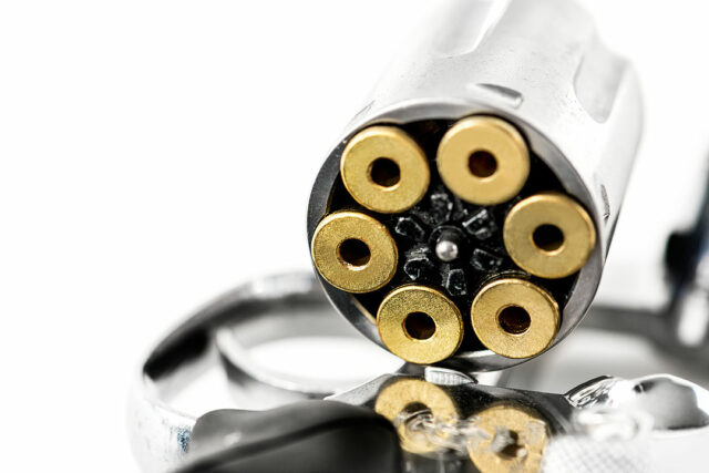 2-macro-shot-gun-isolated-white-background