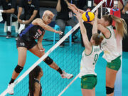Philippines rallies and outlasts taller Australians in five sets