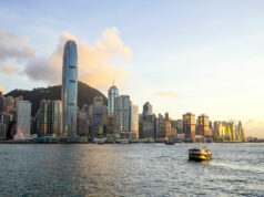 Cargo plane slides off runway in Hong Kong, killing two airport staff