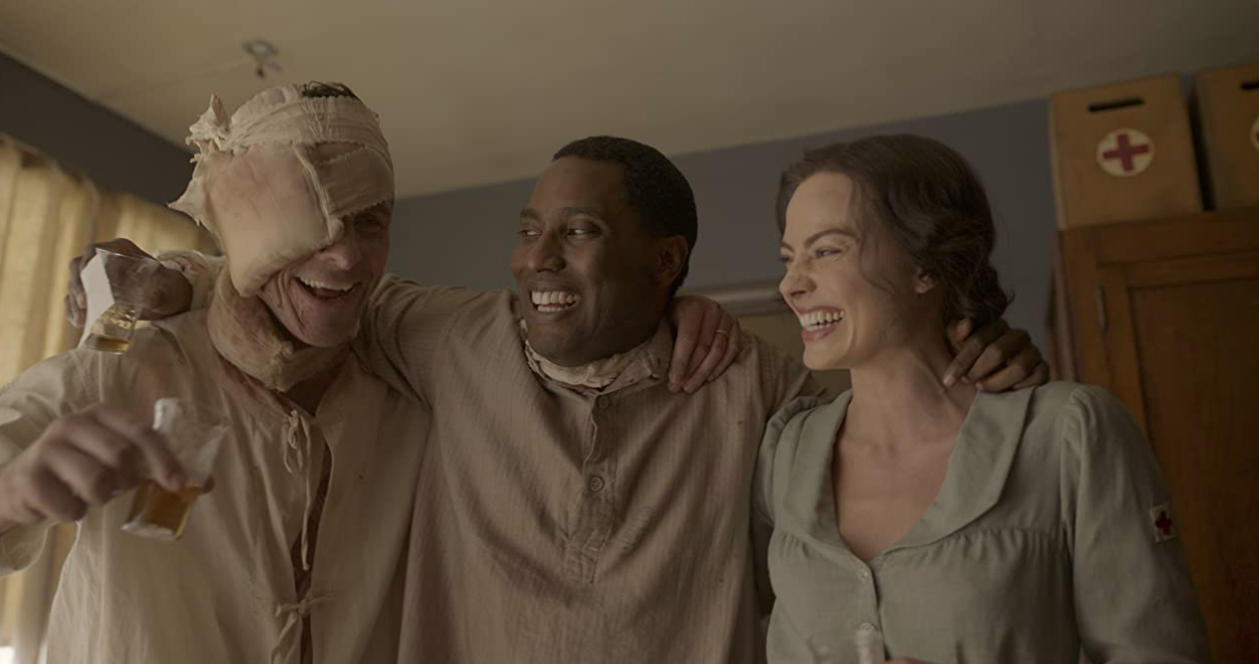 Christian Bale, John David Washington, and Margot Robbie in Amsterdam (2022)