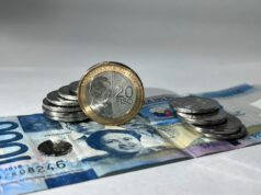 Peso sinks as BSP chief says weak growth may lead to another rate cut