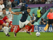 Mbappé powers France into last 16 after win over Denmark