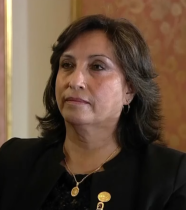 Dina Boluarte, Peru's first female president, pledges to heal nation's