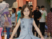 When children’s dresses and suits are an artist’s canvas