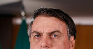 Jair Bolsonaro backs son’s Brazil presidential bid, undergoes hernia surgery