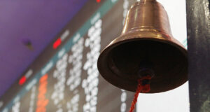 Shares up on bargain hunting, Wall Street’s rise