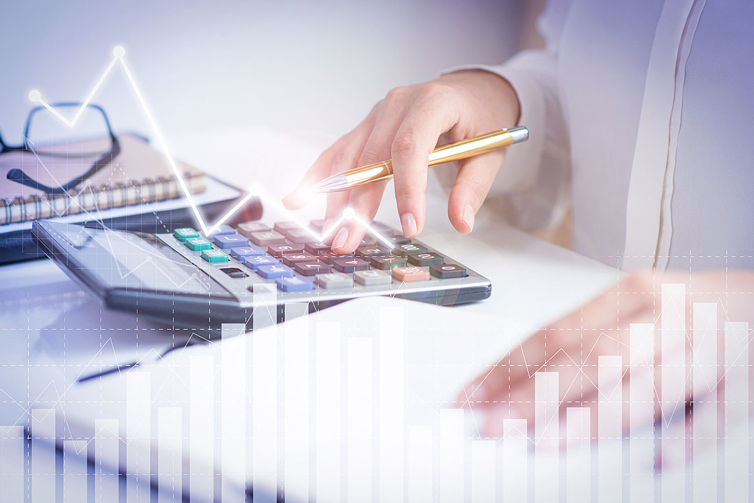 accountant-calculating-profit-with-financial-analysis-graphs