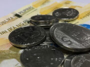 Peso rises to new five-month high as tariff jitters drag dollar