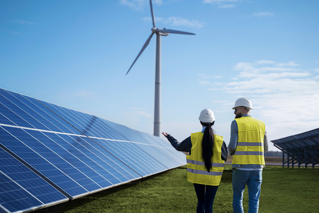 solar pannels-wind mill-workers