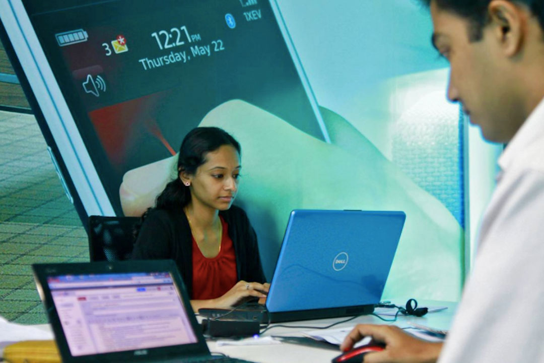 India-employees-computer-laptop