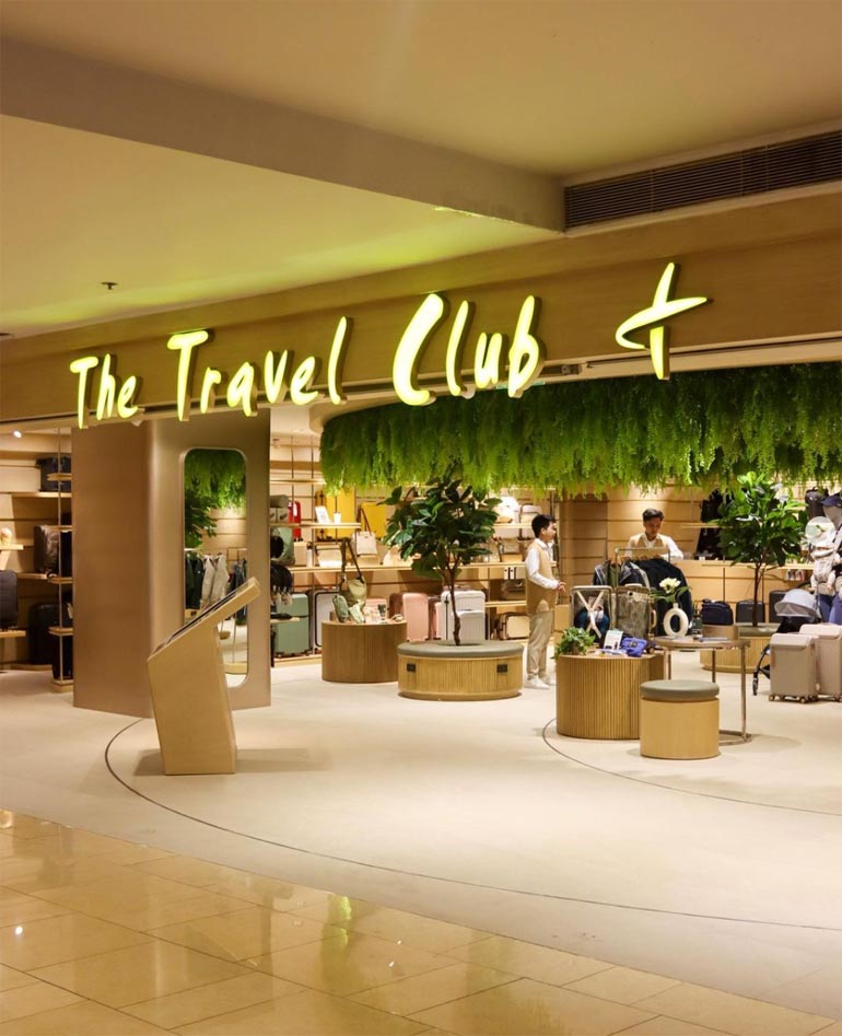 the travel club logo