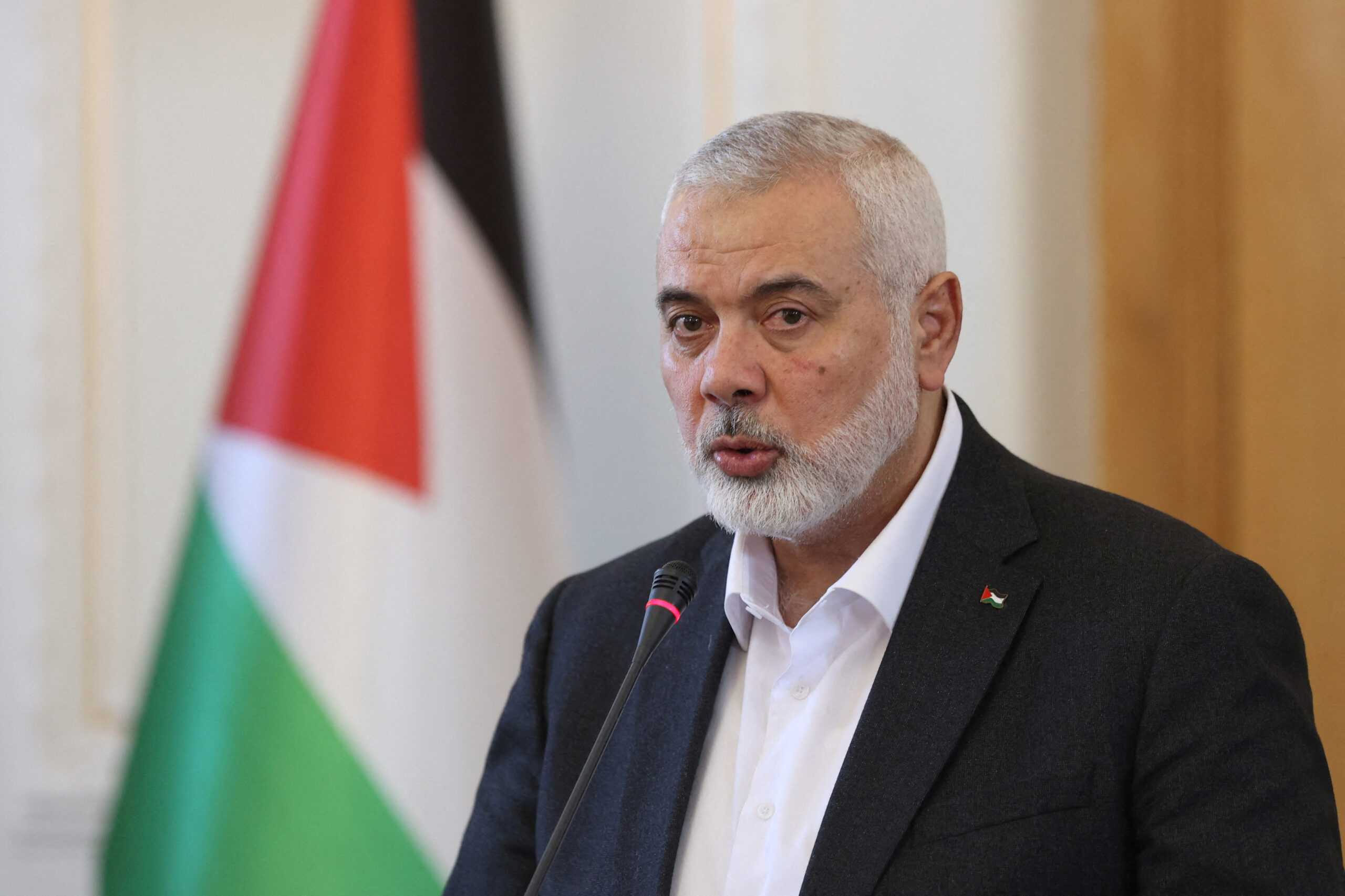 FILE PHOTO: Palestinian group Hamas' top leader, Ismail Haniyeh and Iran's Foreign Minister Hossein Amir Abdollahian attend a press conference in Tehran