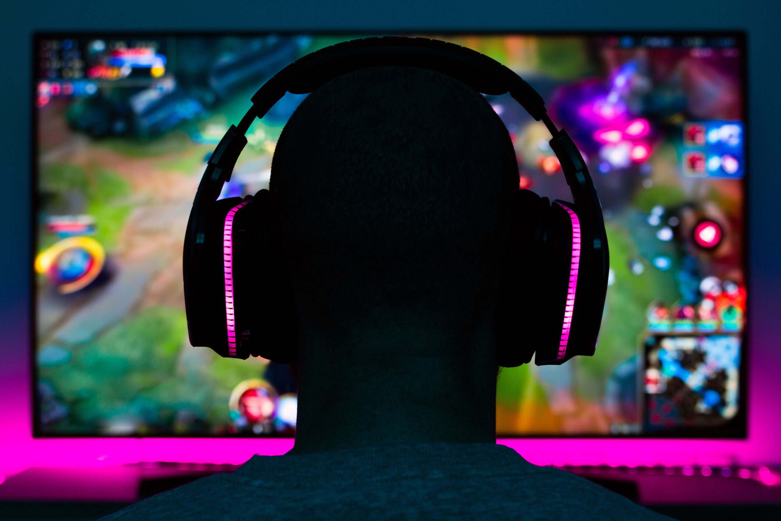 Stock photo of a gamer man playing a video game