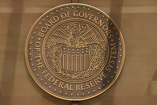 Divided Fed lowers rates, signals pause and one cut next year as growth rebounds