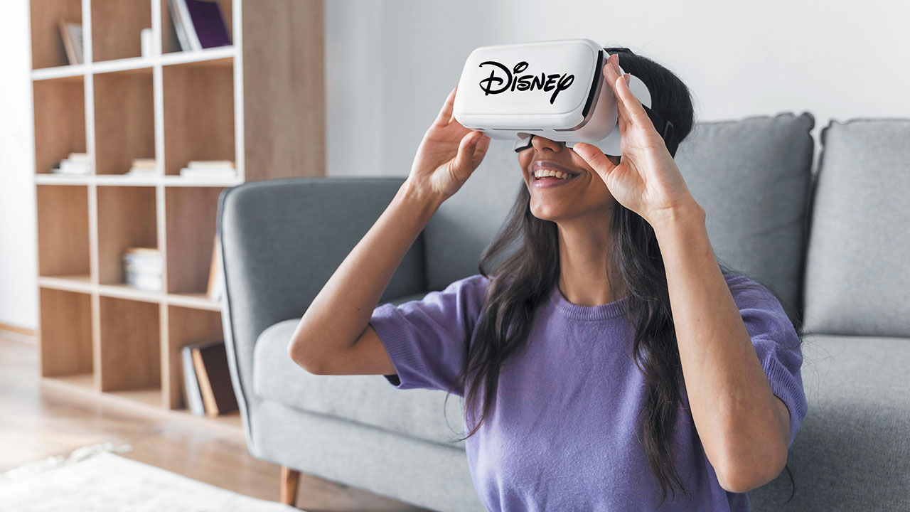 smiley-woman-using-virtual-reality-headset-home-2