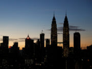 Malaysia growth nears forecast in 2nd quarter, but central bank flags tariff uncertainty