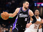 Kings keep postseason hopes alive with win over Cavaliers