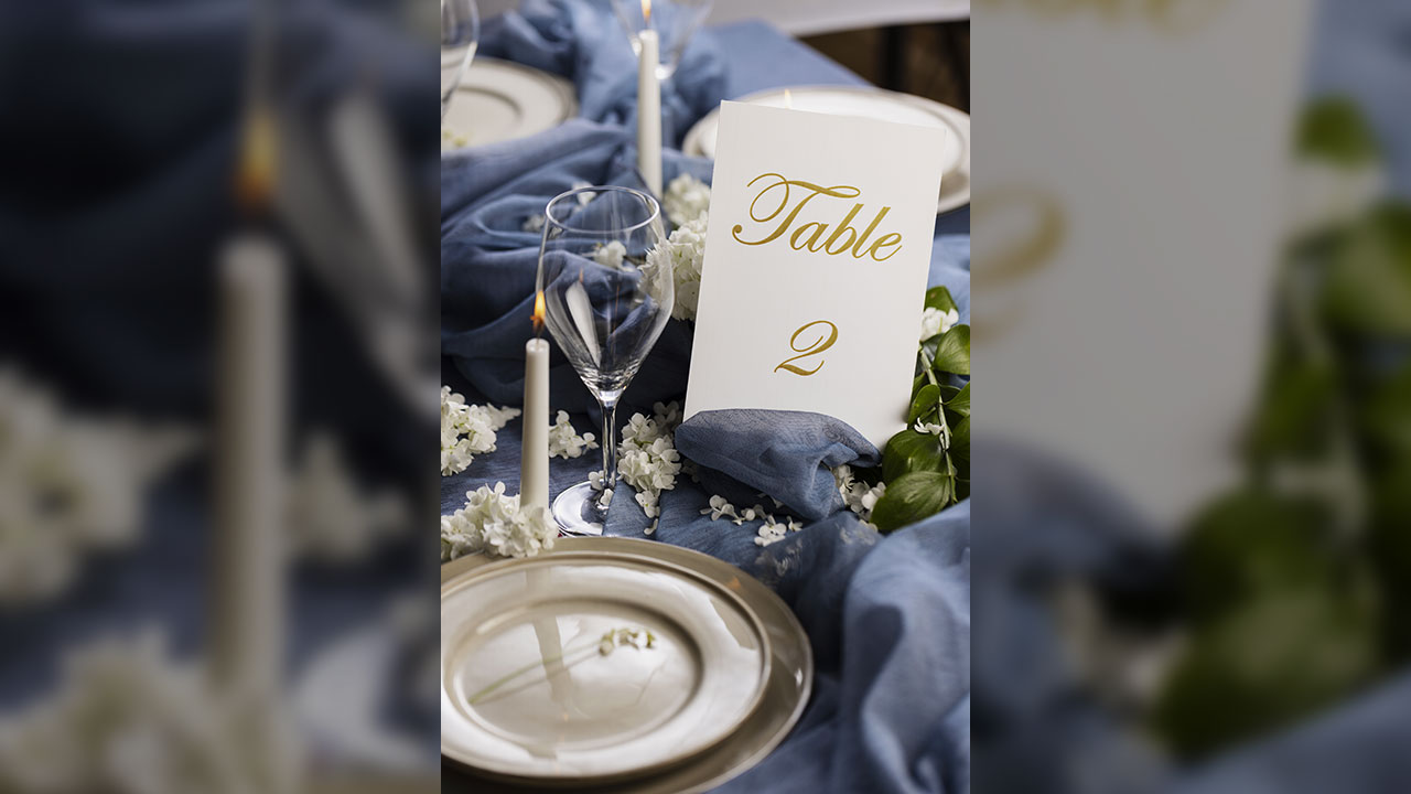 High angle wedding table assortment with plates