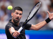 Djokovic battles past Tien to reach US Open 2nd round