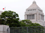 Japan expects growth to accelerate next year with fiscal stimulus