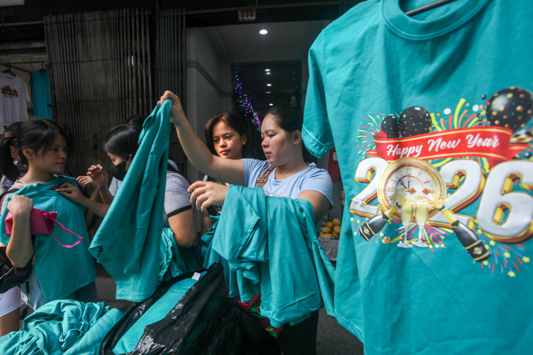 teal-colored T-shirts
