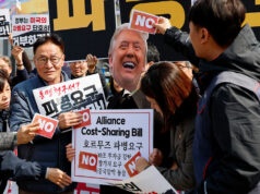 Trump demands others help secure Strait of Hormuz; Japan and Australia say no plans to send ships