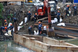 Marcos inspects QC drainage rehab